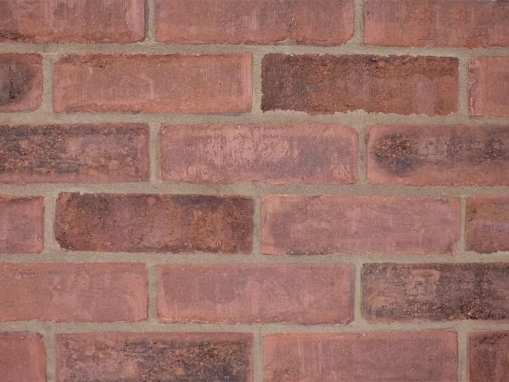 Close up of a wall of Clamp Old Terracotta bricks