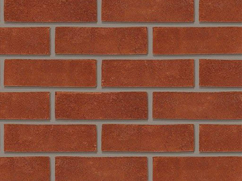 Close up of a wall of Woodbridge Claret Stock bricks