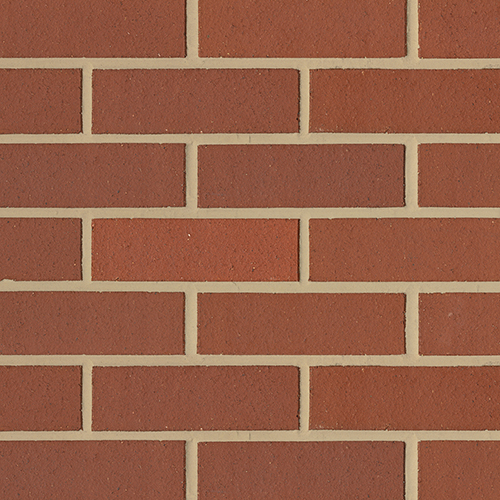 Close up of a wall of Hadley Red Smooth bricks
