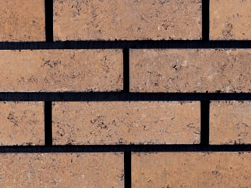 Close up of a wall of Grafton Cream bricks