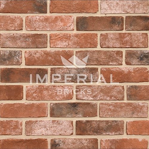 Close up of a wall of Reclamation Weathered Soft Red bricks