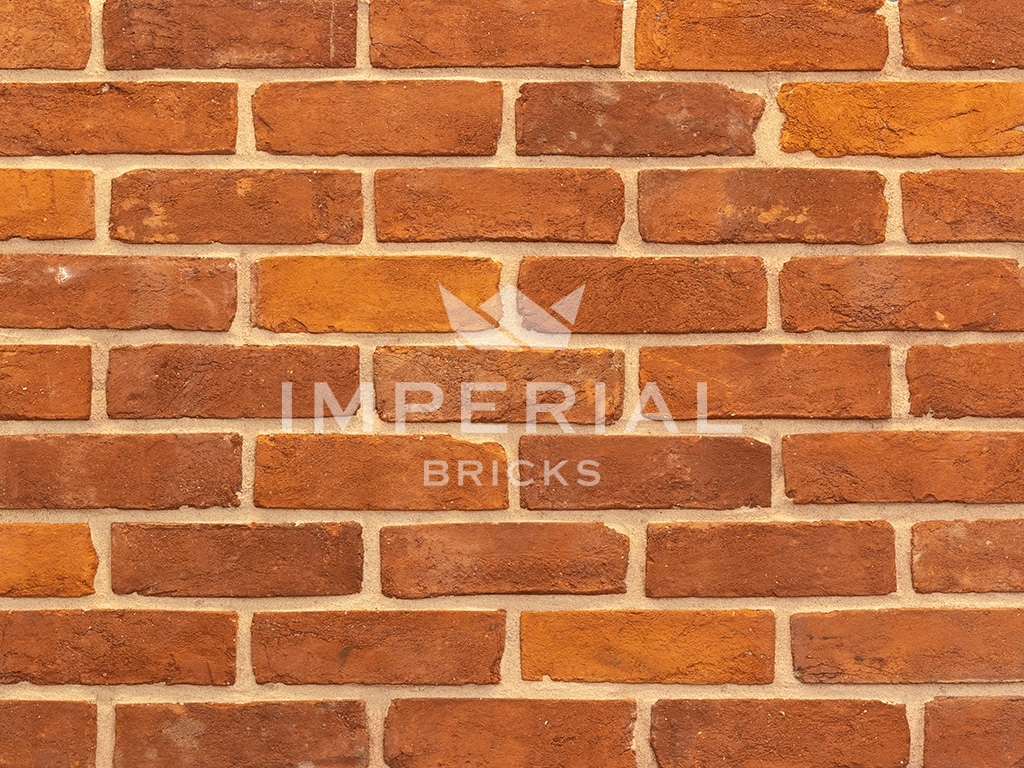 Close up of a wall of Regency Red Multi bricks