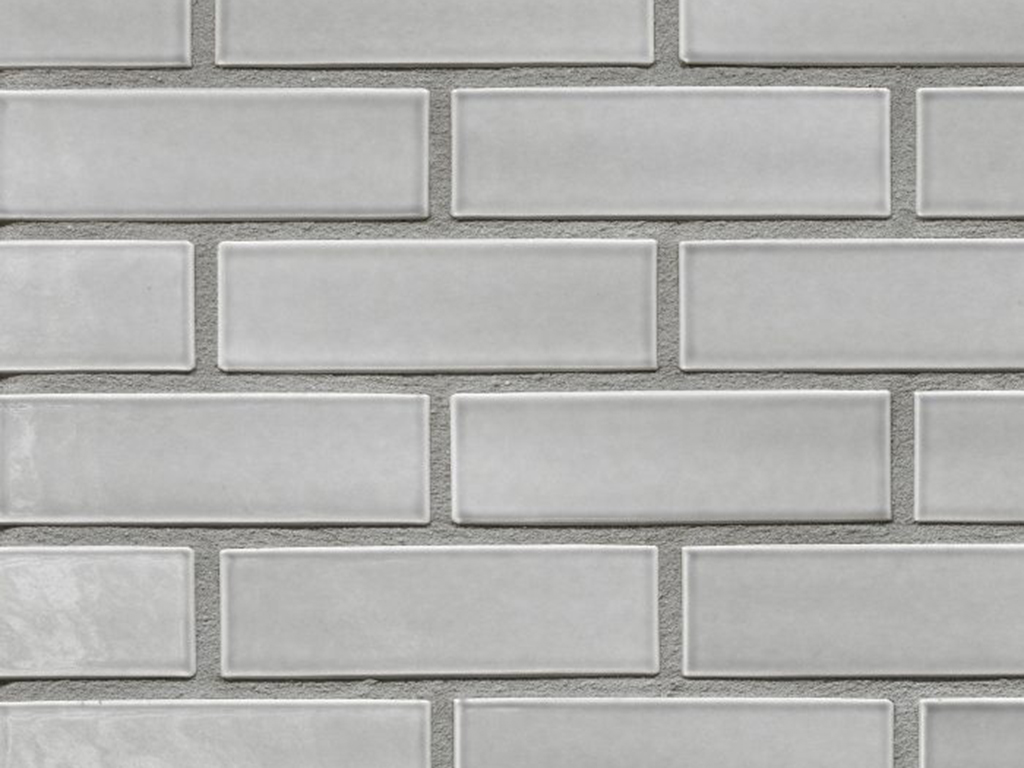 Close up of a wall of California Light Grey Glazed bricks