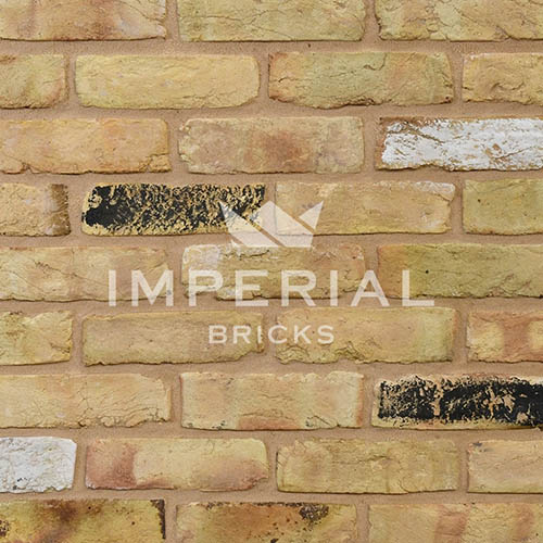 Close up of a wall of Yellow Stock 68mm bricks