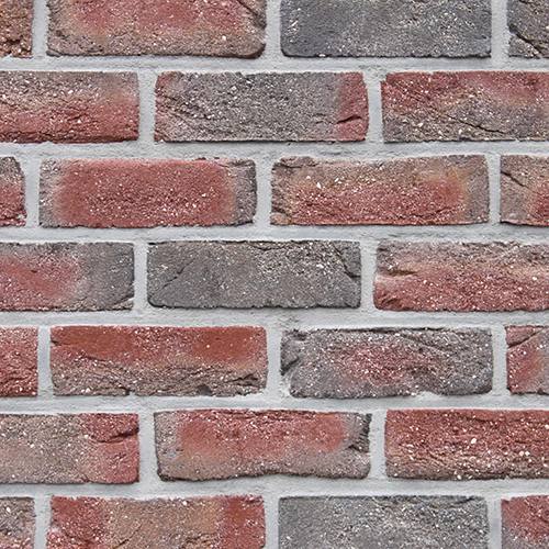 Close up of a wall of Cranford Red Multi bricks