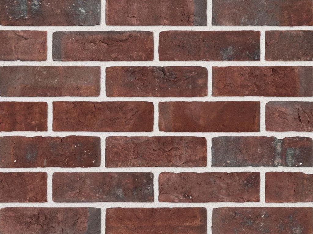Close up of a wall of Victory Red Multi bricks