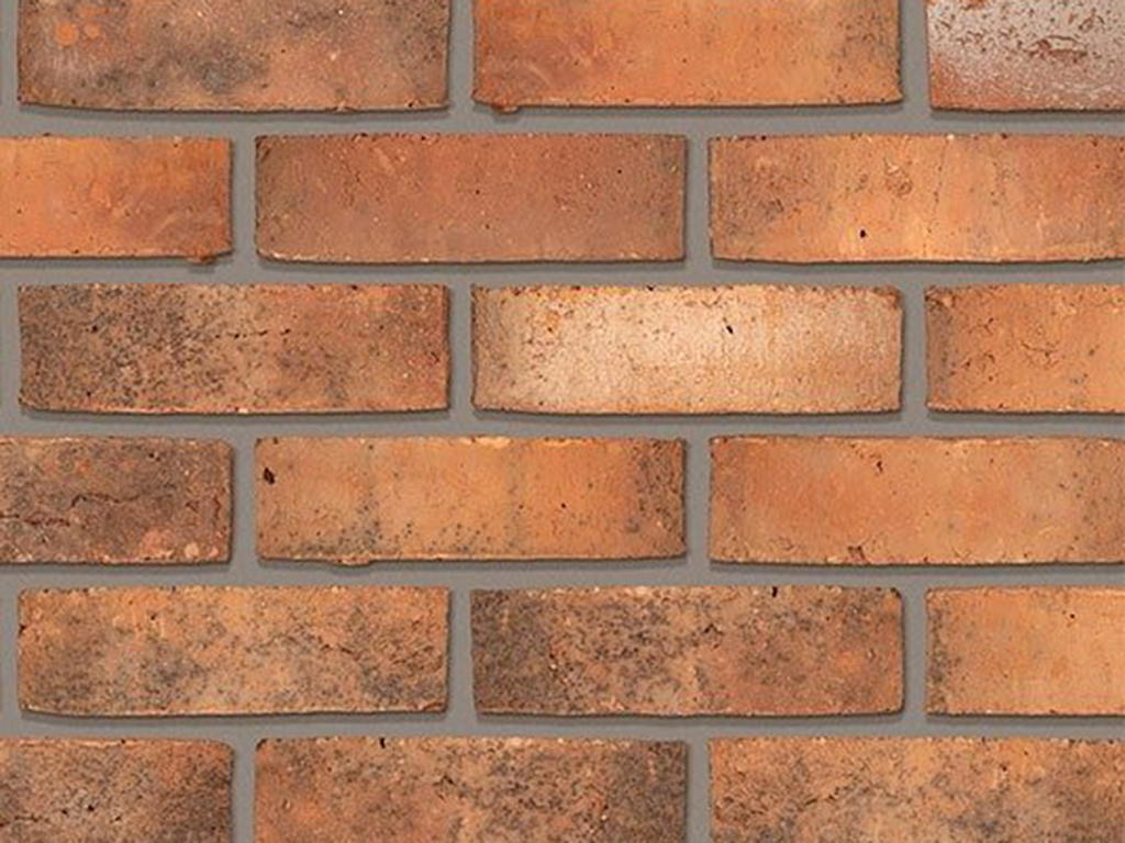 Close up of a wall of Reclaimed Shire Sovereign Stock bricks