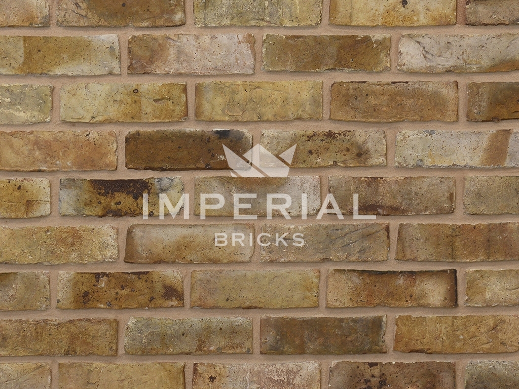 Close up of a wall of Light Weathered Original London Stock bricks