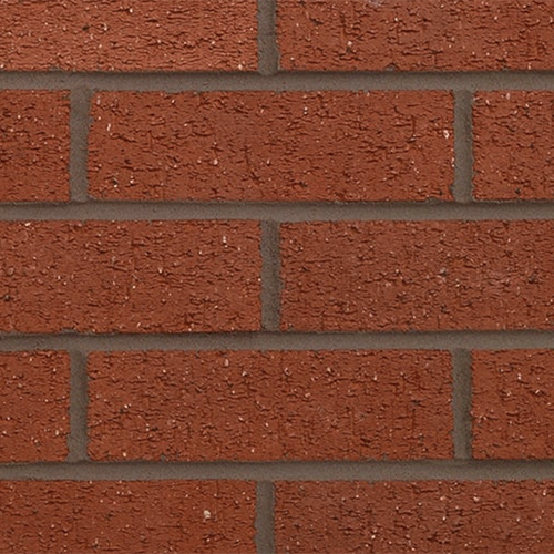 Close up of a wall of County Red Rustic 73mm bricks