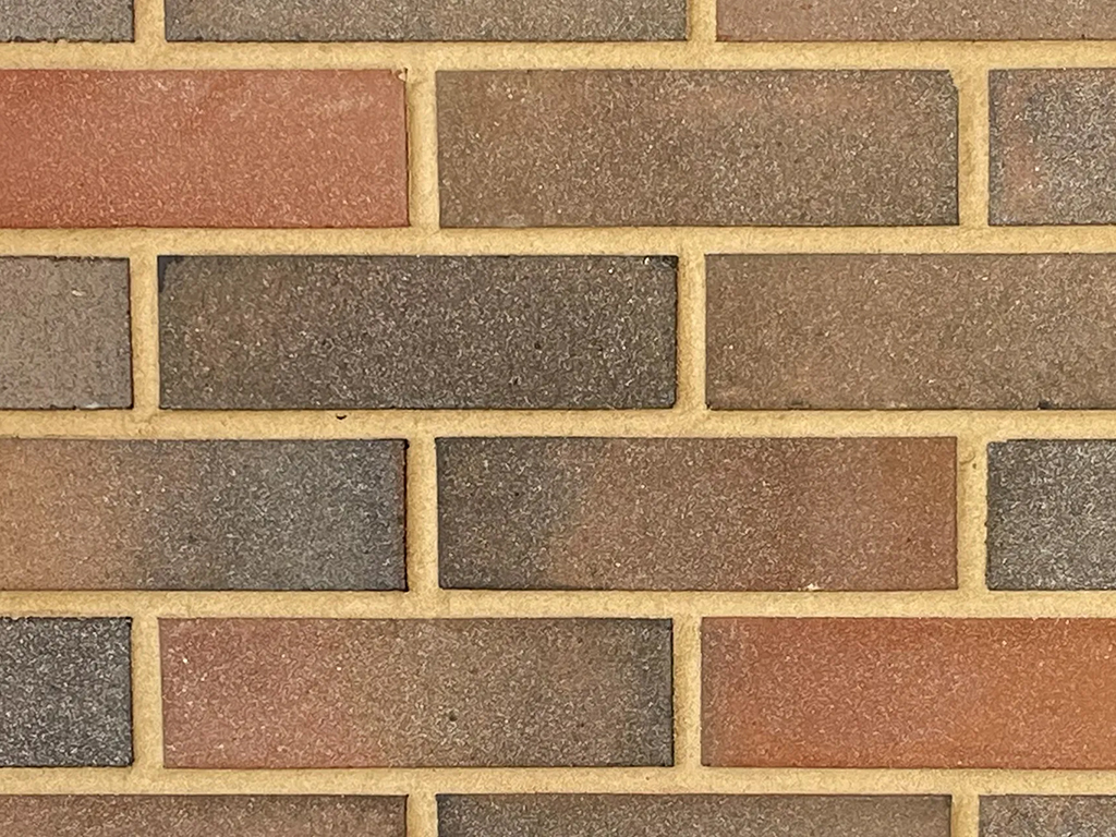 Close up of a wall of Adlington Multi bricks