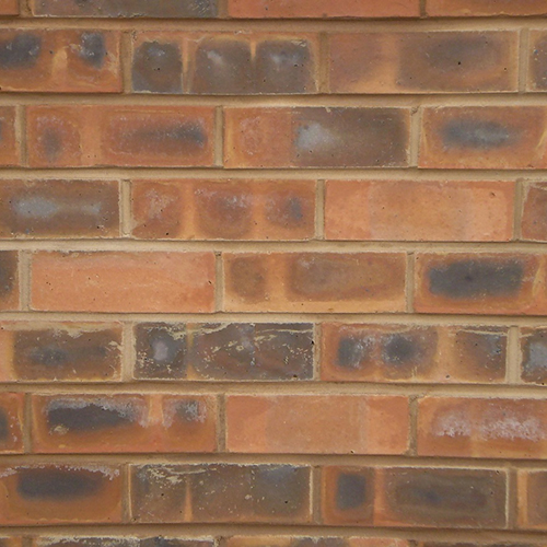 Close up of a wall of Tollerton bricks