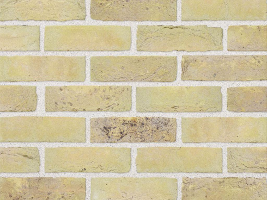 Close up of a wall of Olde Ely Cream Multi bricks