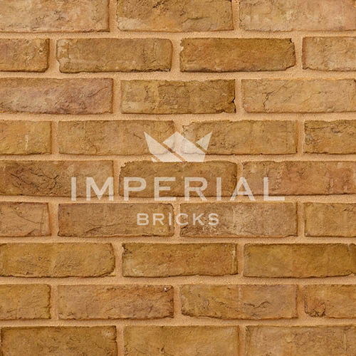 Close up of a wall of Windsor Yellow bricks