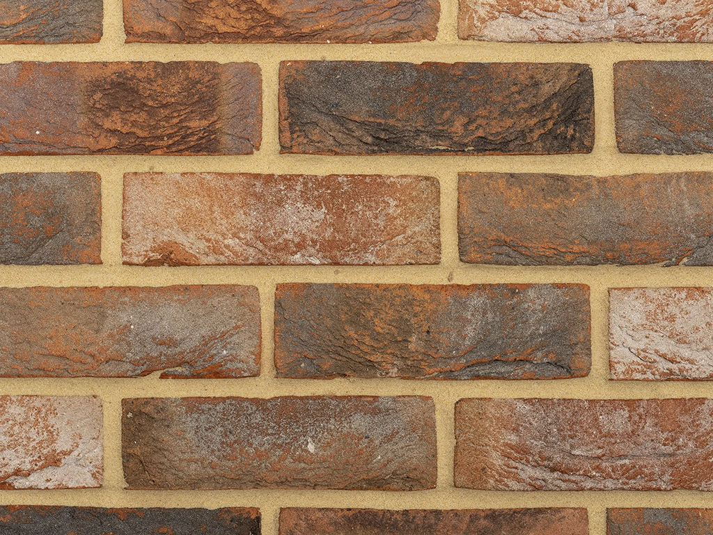 Close up of a wall of Hartford Red Multi bricks