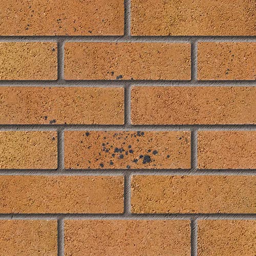 Close up of a wall of Leighton Saffron bricks
