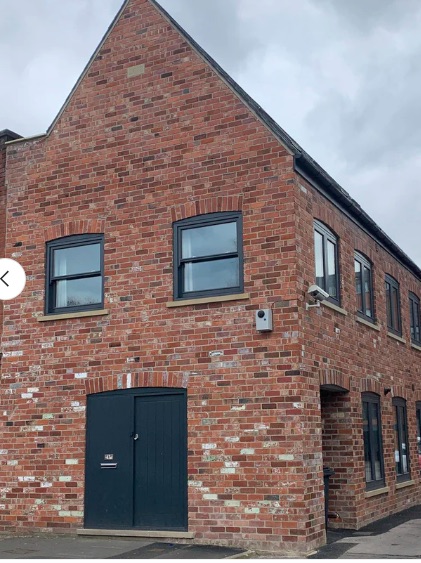 Project view house shot in industrial blend pressed brick