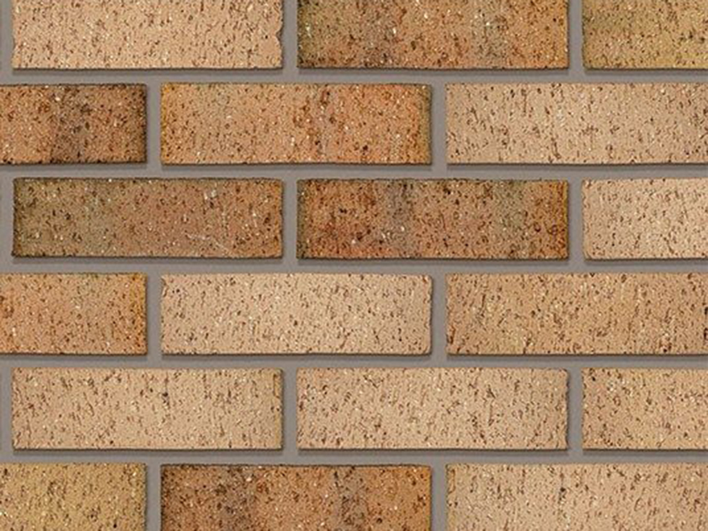 Close up of a wall of Leamington Buff Multi bricks