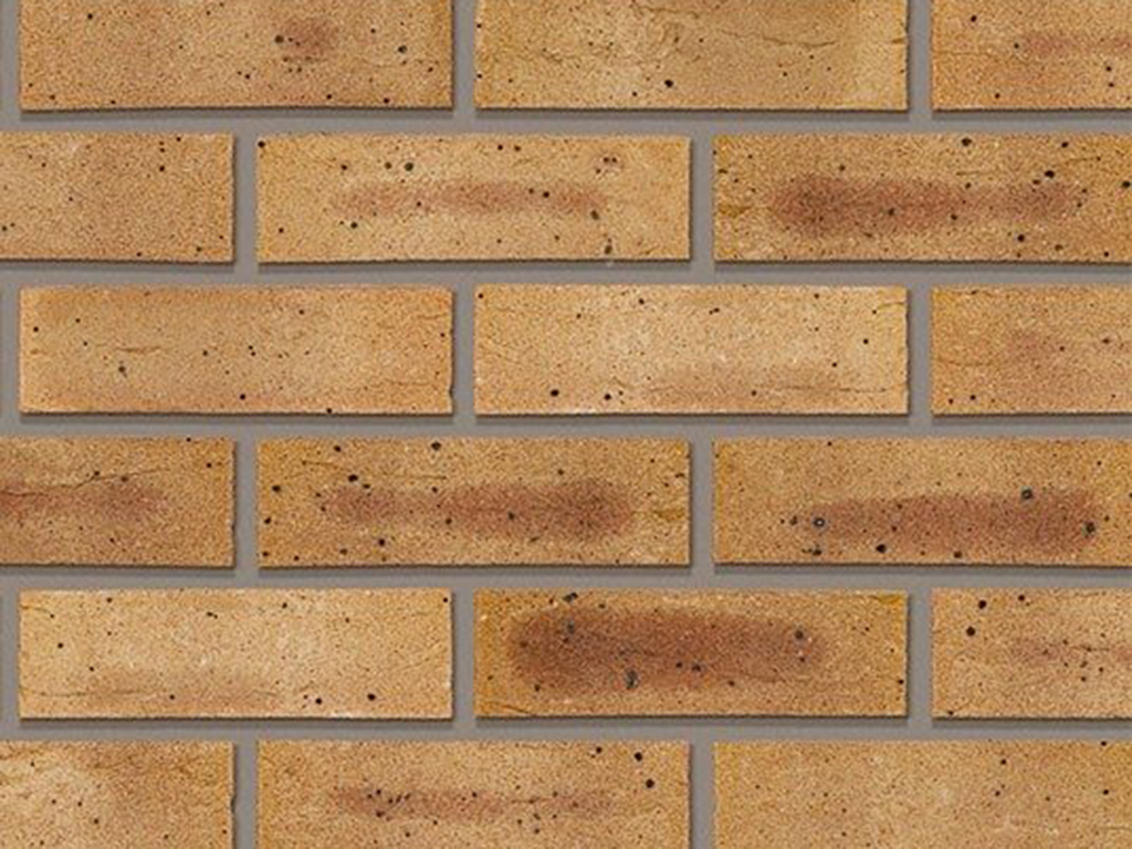 A wall of Harvest Buff Multi bricks