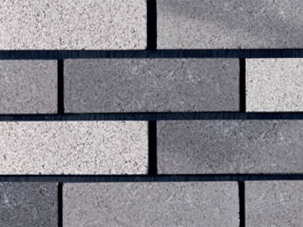 Close up of a wall of Silver Birch bricks