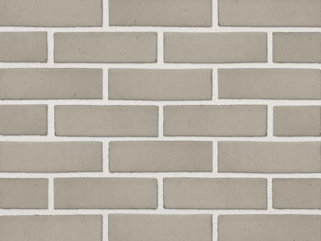 Close up of a wall of Light Grey Smooth bricks