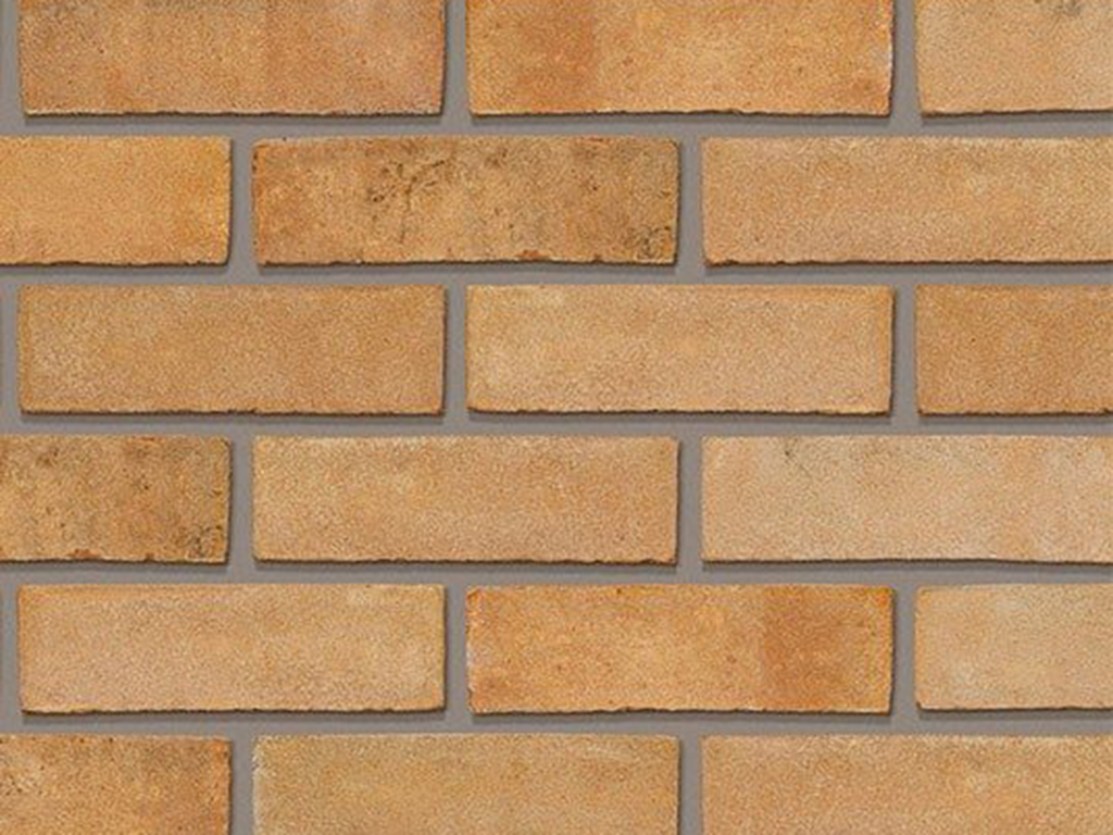 Close up of a wall of Tawny Buff bricks