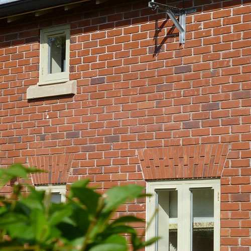 An exterior of a house built using Old Pluckley Blend bricks