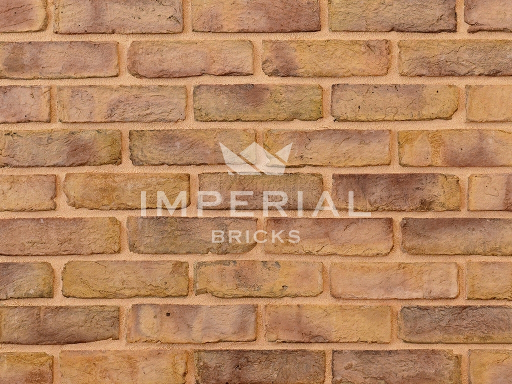 Close up of a wall of Windsor Weathered Yellow Multi Stock bricks