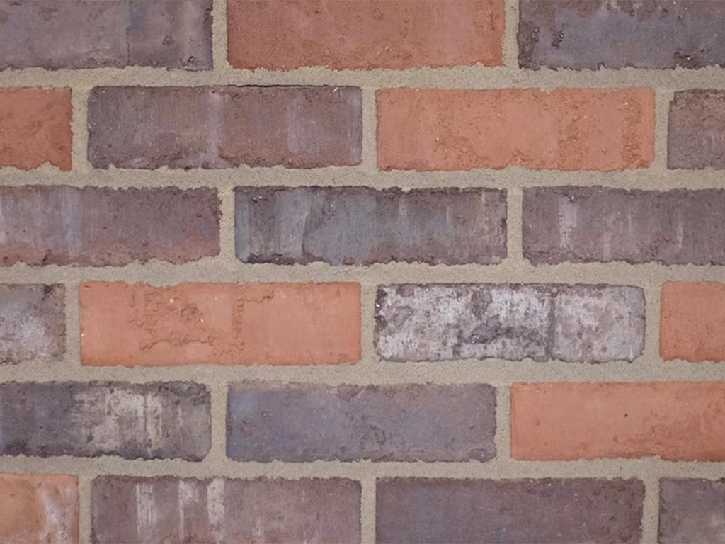 Close up of a wall of Clamp Ember Grey bricks
