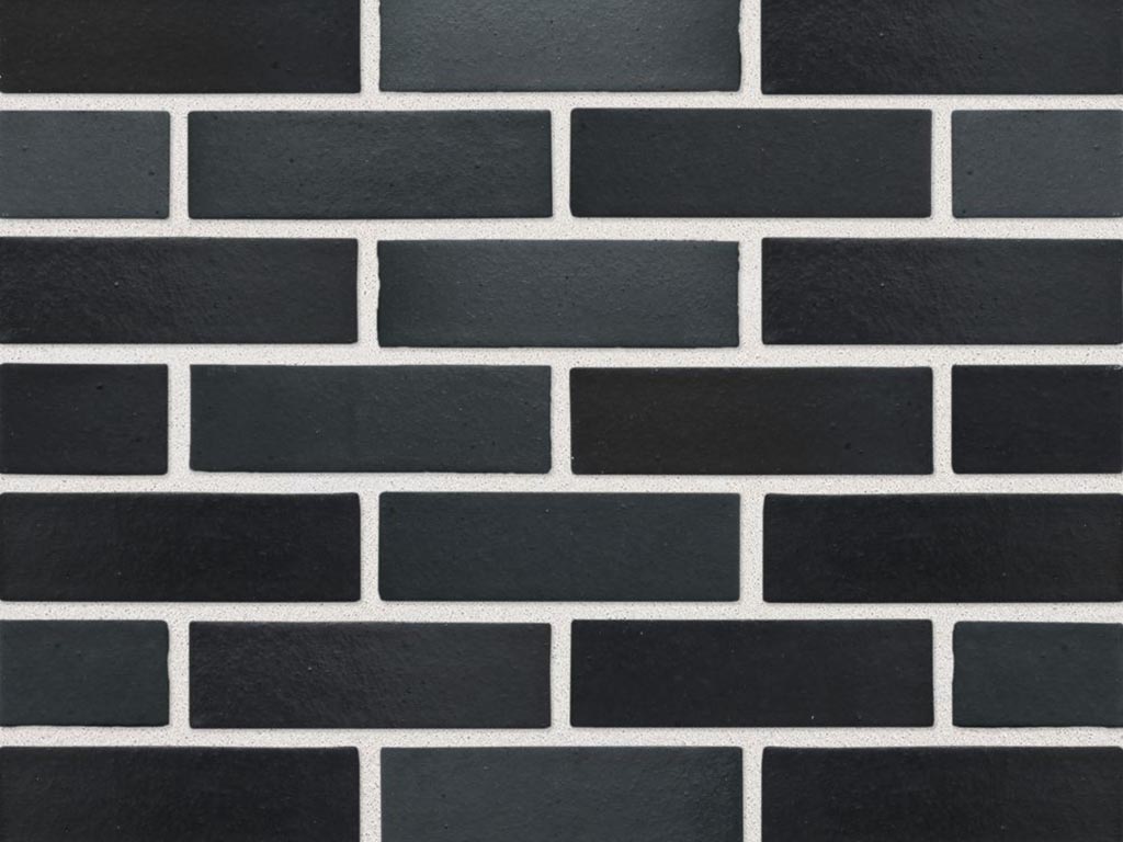 Close up of a wall of Blue Black Multi Smooth bricks