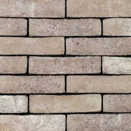 A wall of Forum Smoked Branco bricks