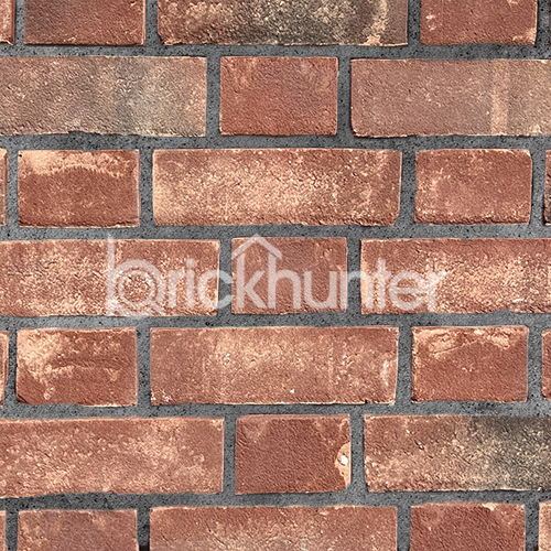 Close up of a wall of New Red Multi GIlt Stock bricks