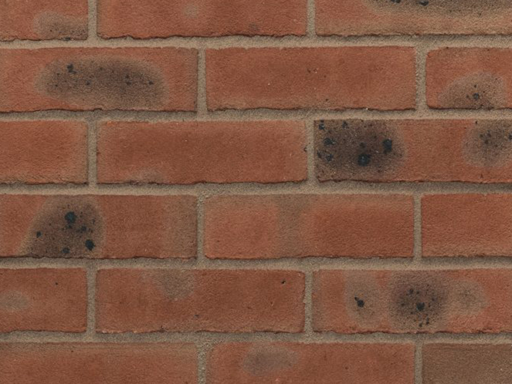 Close up of a wall of Nutcombe Multi Stock bricks