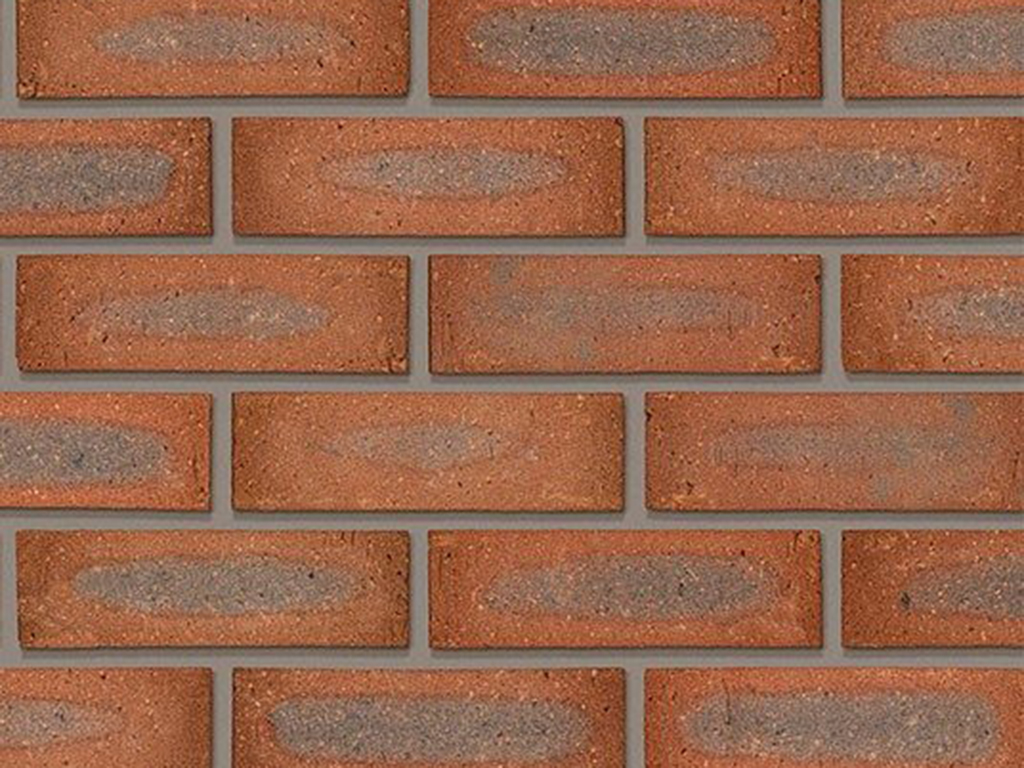 Close up of a wall of Titian bricks