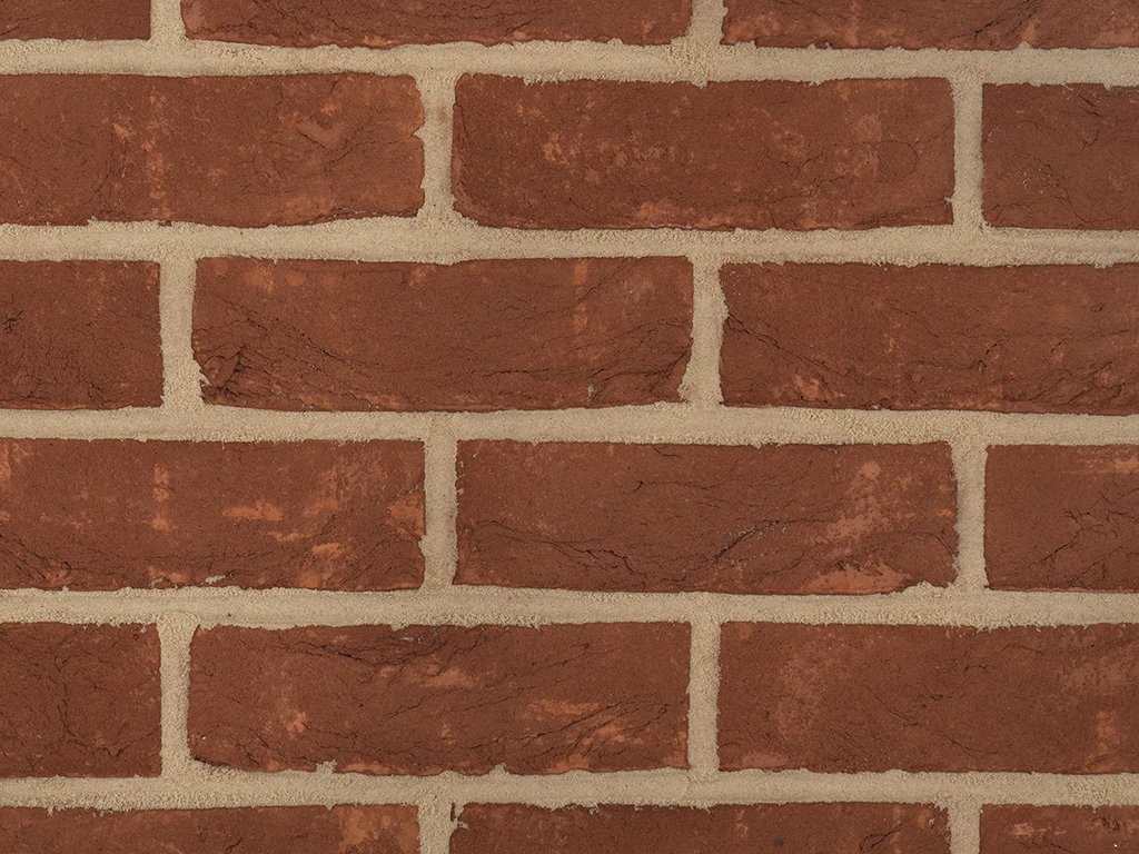 Close up of a wall of Bordeaux bricks