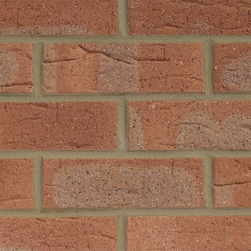 Close up of a wall of Kimbolton Red Multi bricks