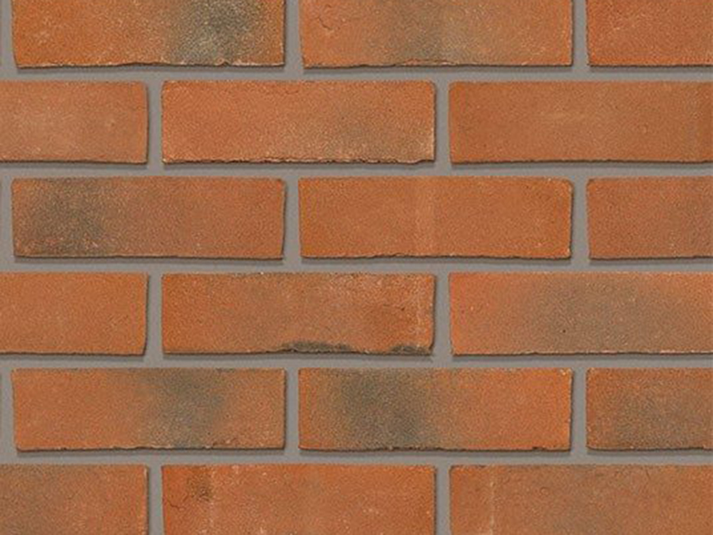 A wall of Orange Multi Gilt Stock bricks