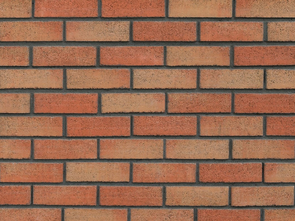 Close up of a wall of Kingston Autumn Gold bricks