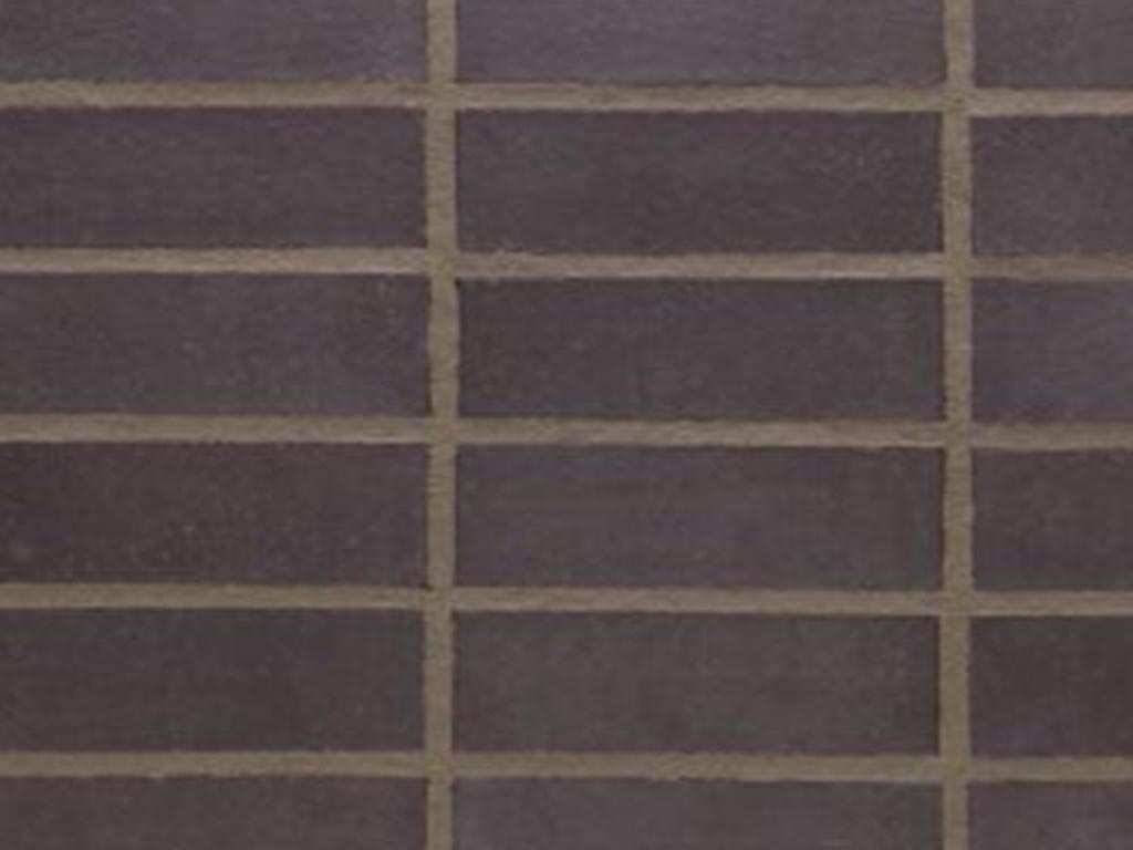 Close up of a wall of Basalt Black bricks