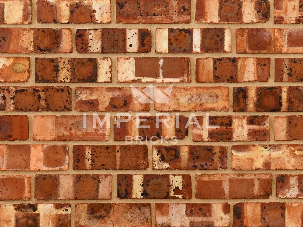 Close up of a wall of Weathered Cheshire Pre War bricks