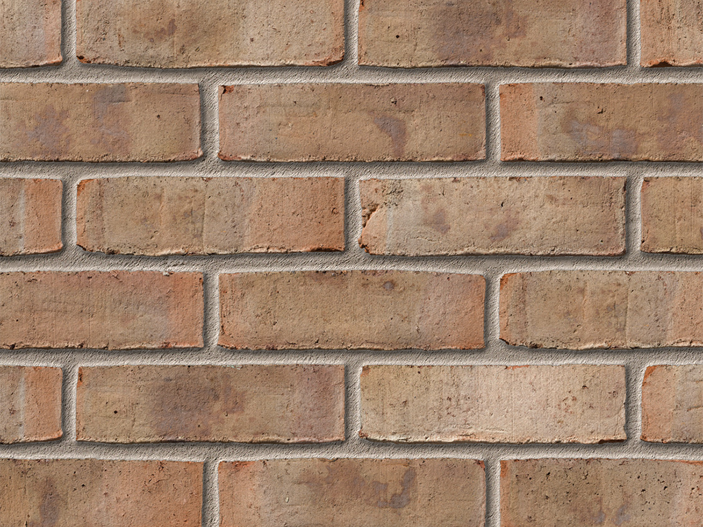 Close up of a wall of Birtley Olde English Buff bricks