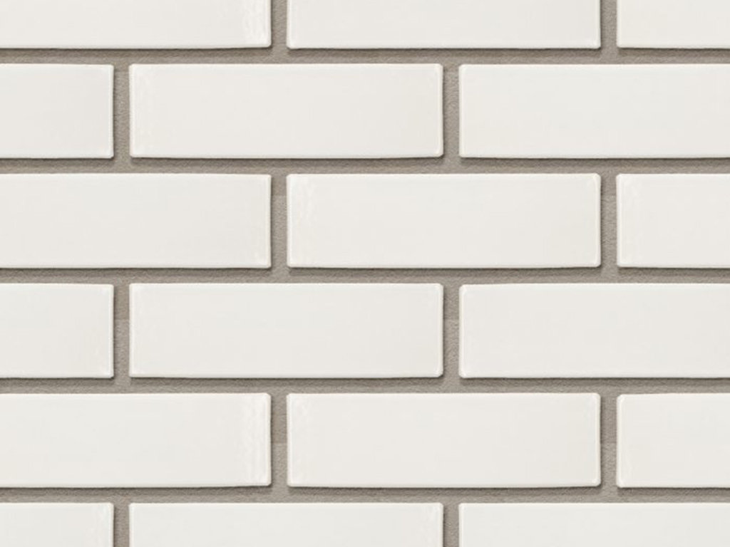 Close up of a wall of London White Glazed bricks