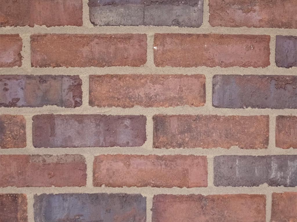 CLose up of a wall of Clamp Newby Blend bricks