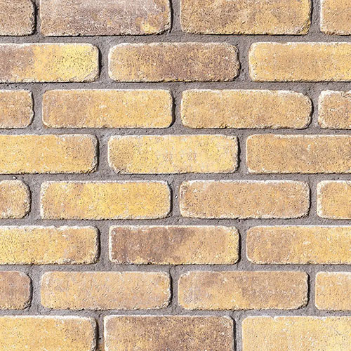 Close up of a wall of Durrow Cream Antique bricks