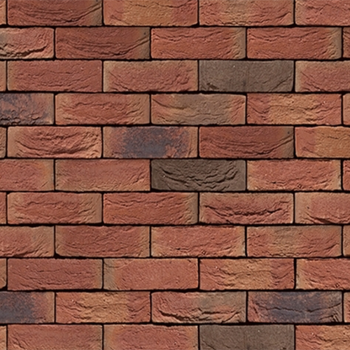 CLose up of a wall of Autumn Red bricks