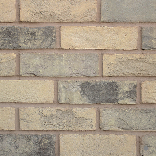Close up of a wall of Milton Hall Light Blend bricks