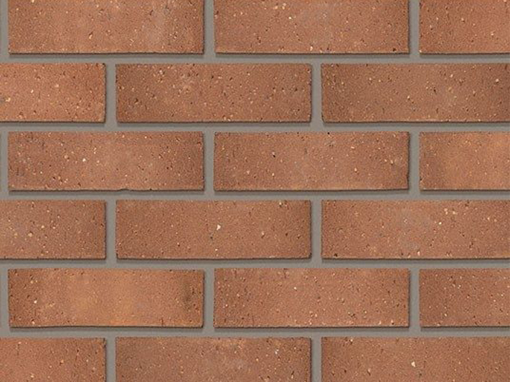 Close up of a wall of Berkshire Red bricks
