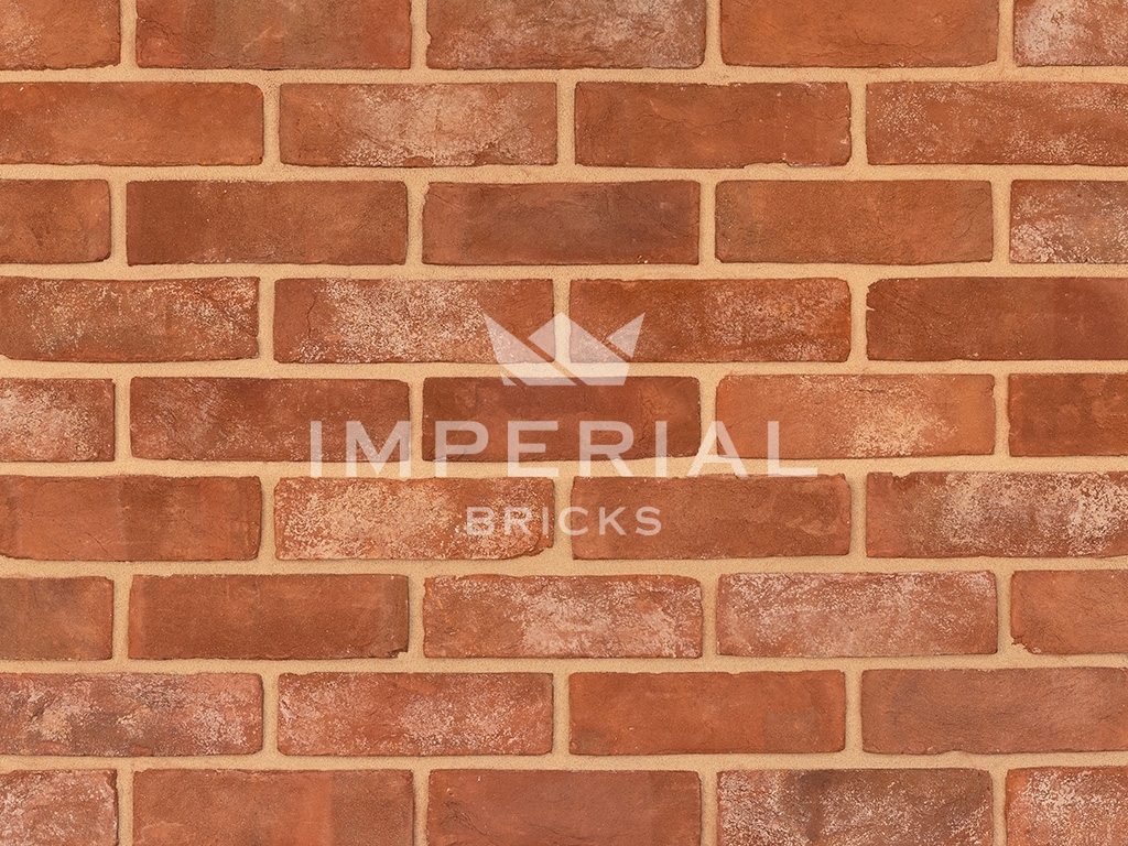 Close up of a wall of Reclamation Soft Red bricks