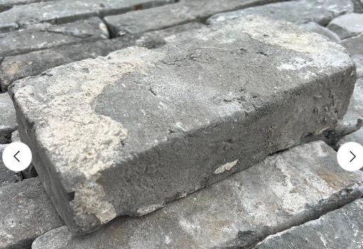 view of single brick in grey handmade