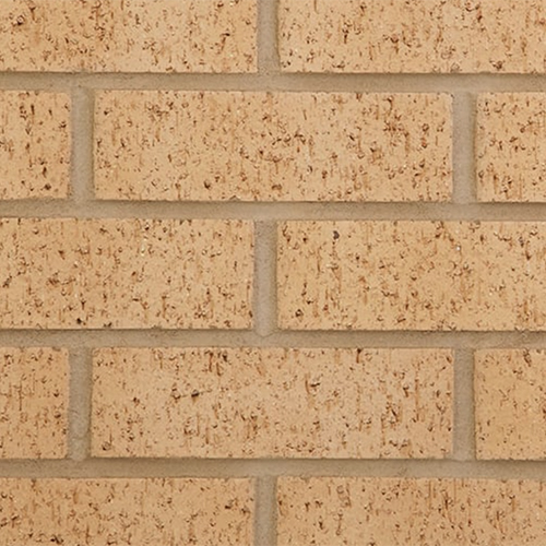 Close up of a wall of Cumbria Buff Rustic bricks