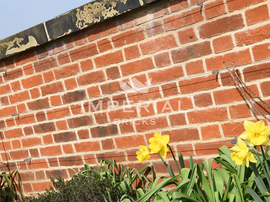 A garden wall built using Country Blend bricks